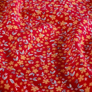 Popeline de viscose rouge à fleurs