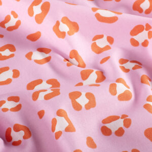 Popeline panthère fond rose