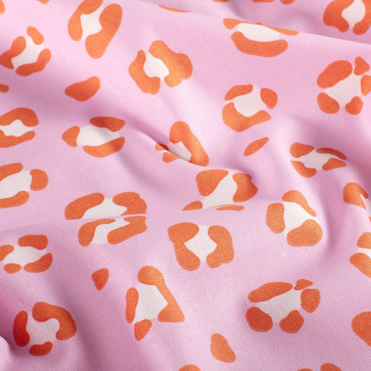 Popeline panthère fond rose