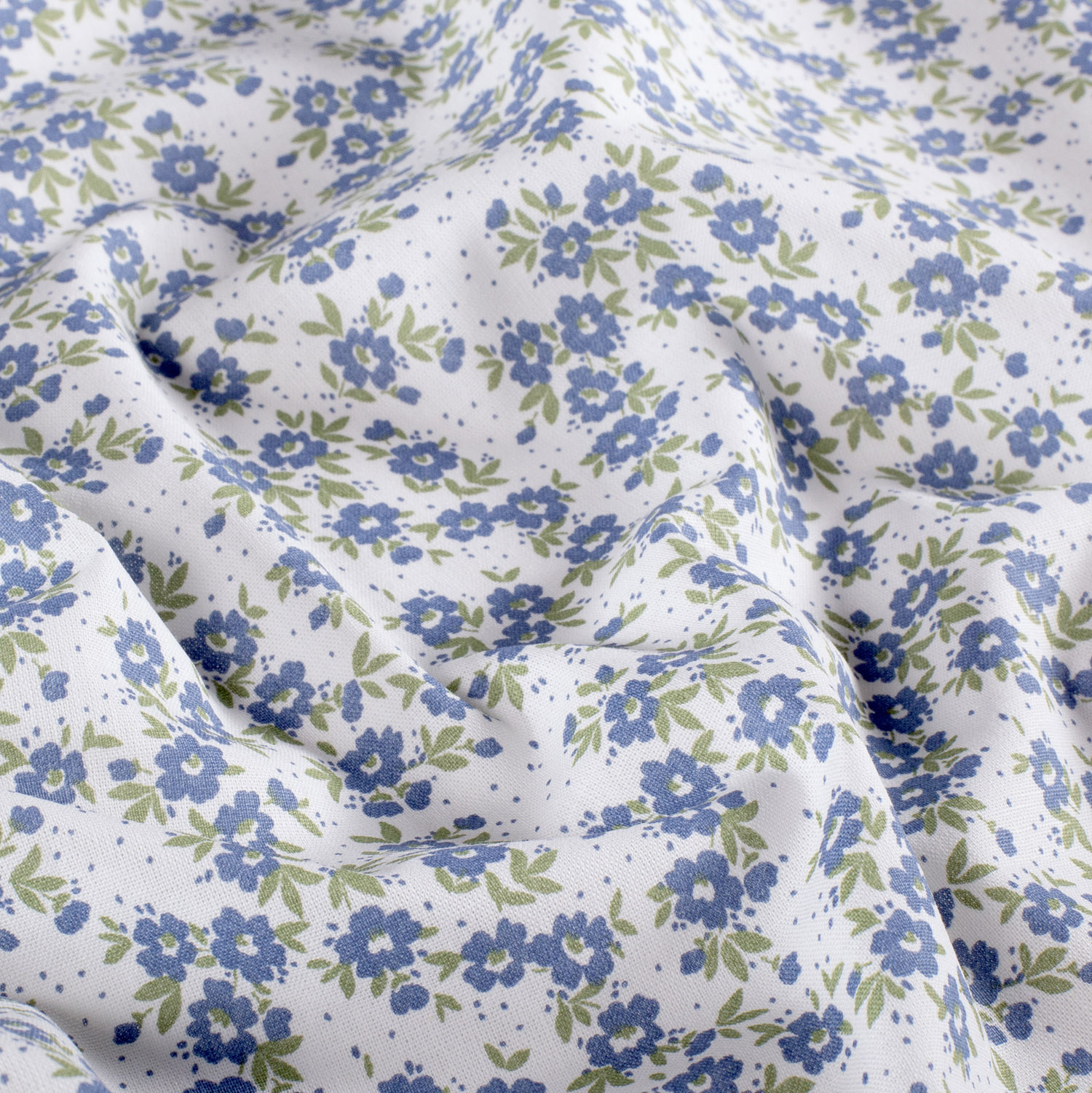 Popeline petites fleurs bleues fond blanc